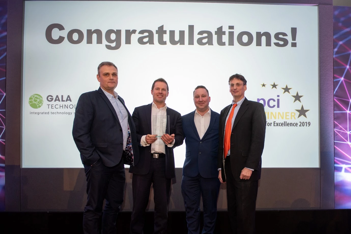 From Left To Right Steve Biggs, Jason Mace, Steve Jones From Gala Technology - Simon Brady From AKJ Associates