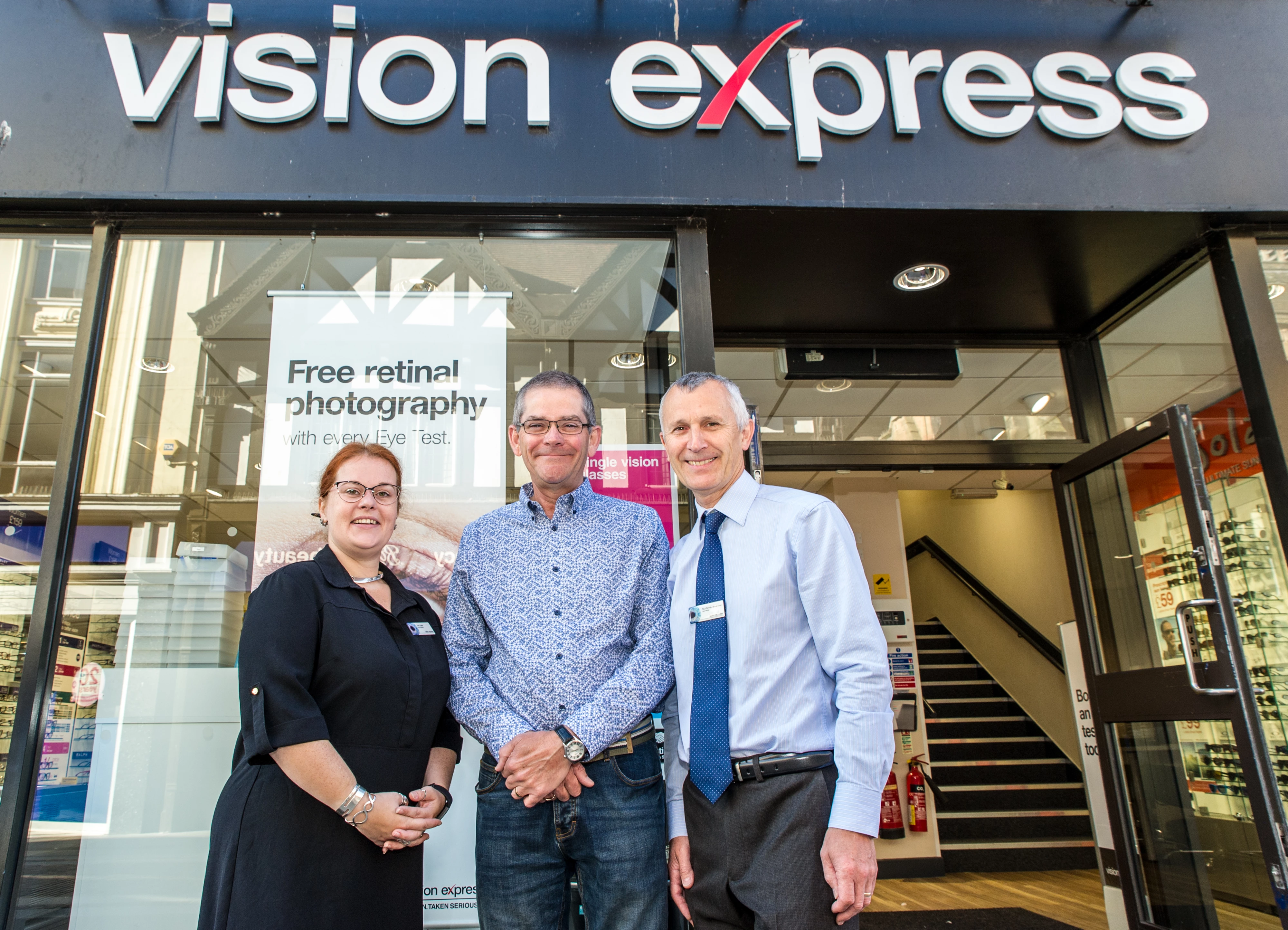 L-R: Vision Express store manager Terri Cook, Gerald Cook and optometrist Paul Royds
