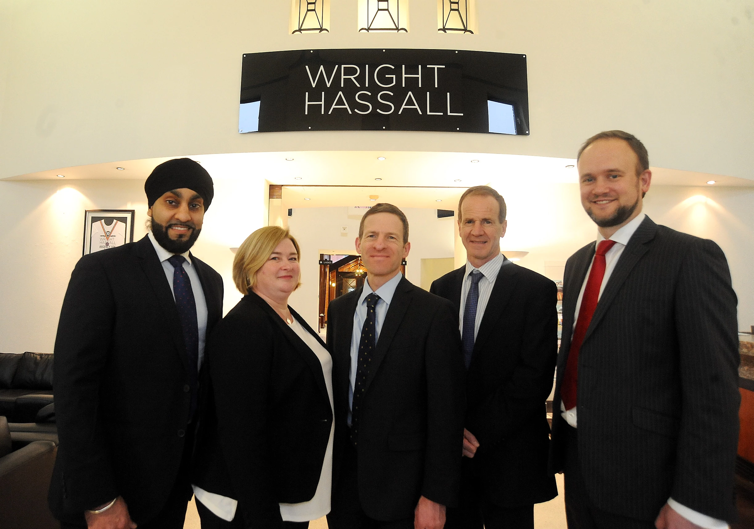 : left to right - Jugdeep Chaggar, Nichola Vine, Stuart Thwaites, Philip Harris & Michael Hiscock from the construction team at Wright Hassall