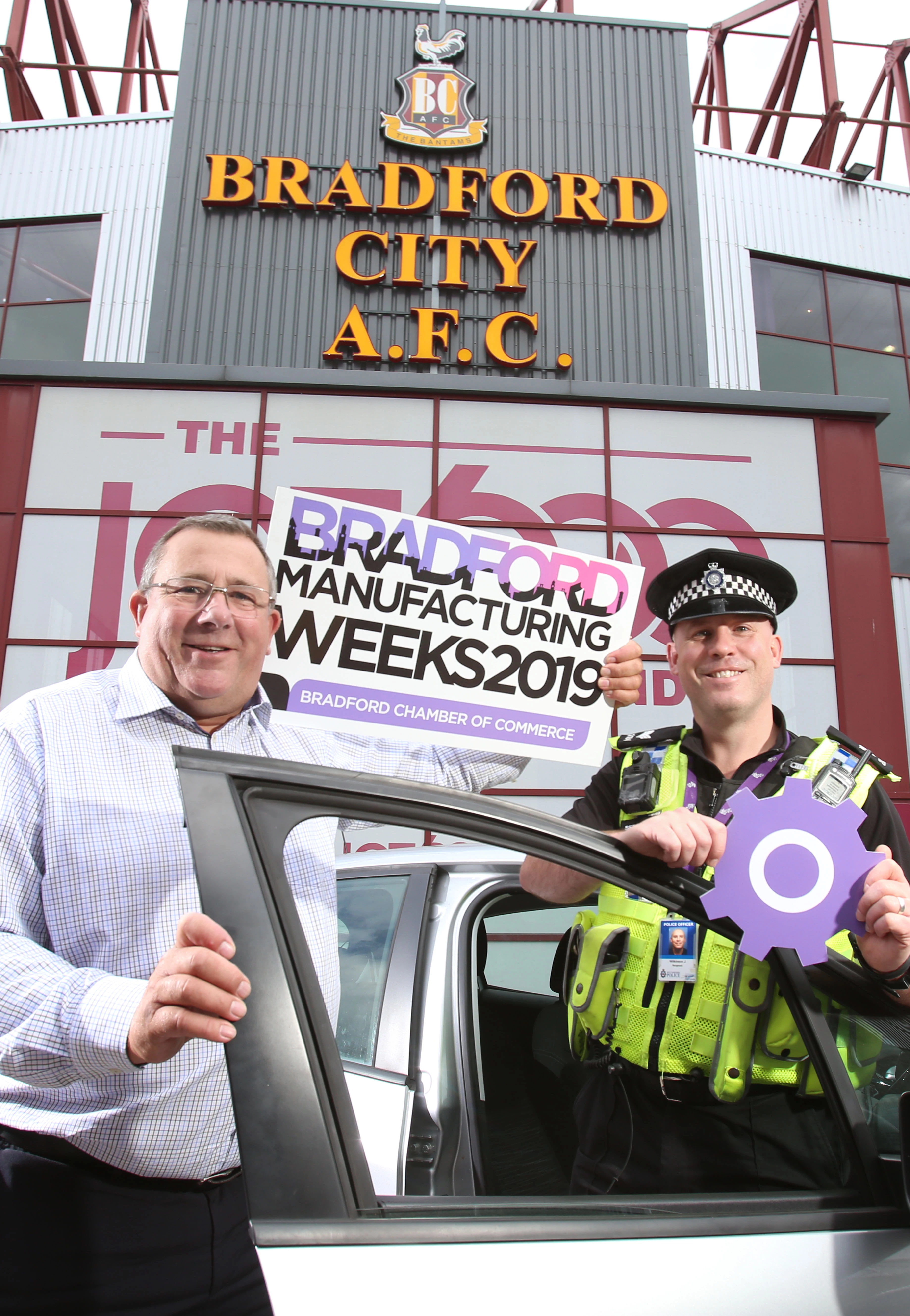 Christeyns UK MD Nick Garthwaite (left) with Sergeant of West Yorkshire Police Jamie Wilkinson (right)