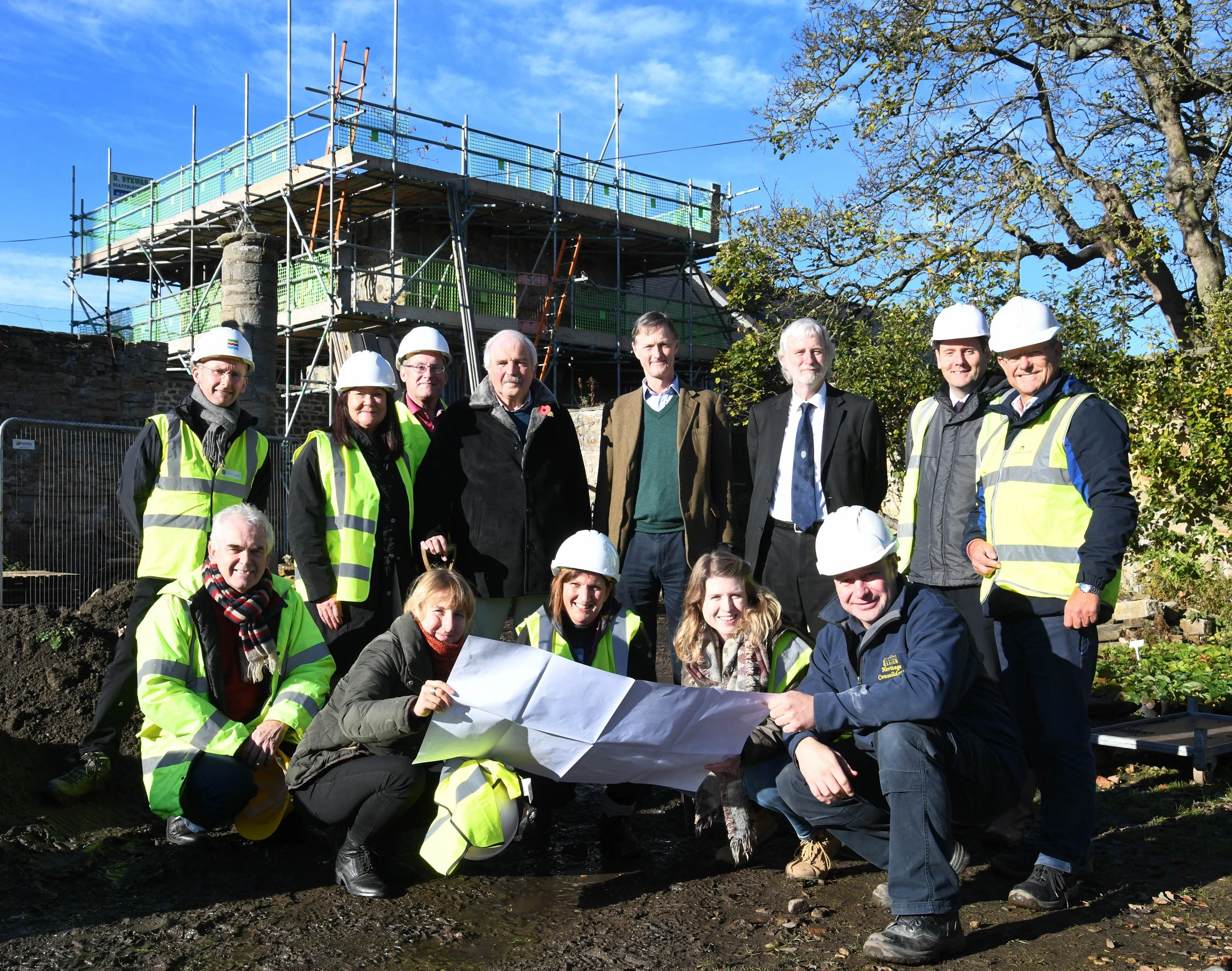 Funders, contractors and supporters for West Mural Tower, with staff and volunteers from The Auckland Project. Photograph by Barry Pell, courtesy of The Auckland Project.