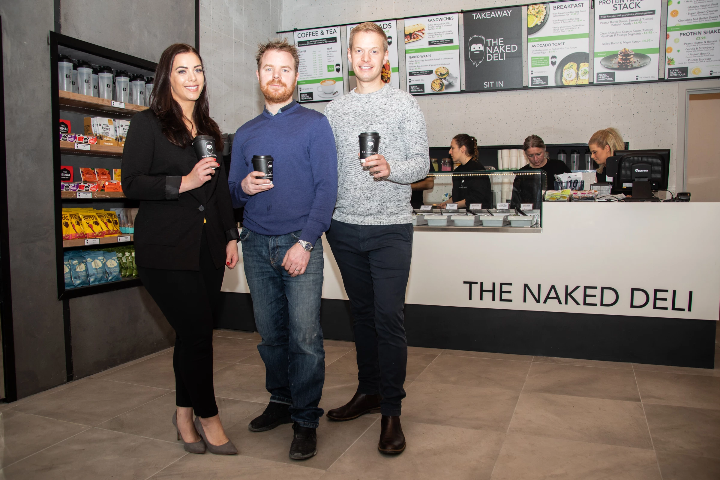 Naked Deli property director Ian Jones (centre) with St James’ Square associate Jenny Atkin and head of real estate commercial property Martin Wilson