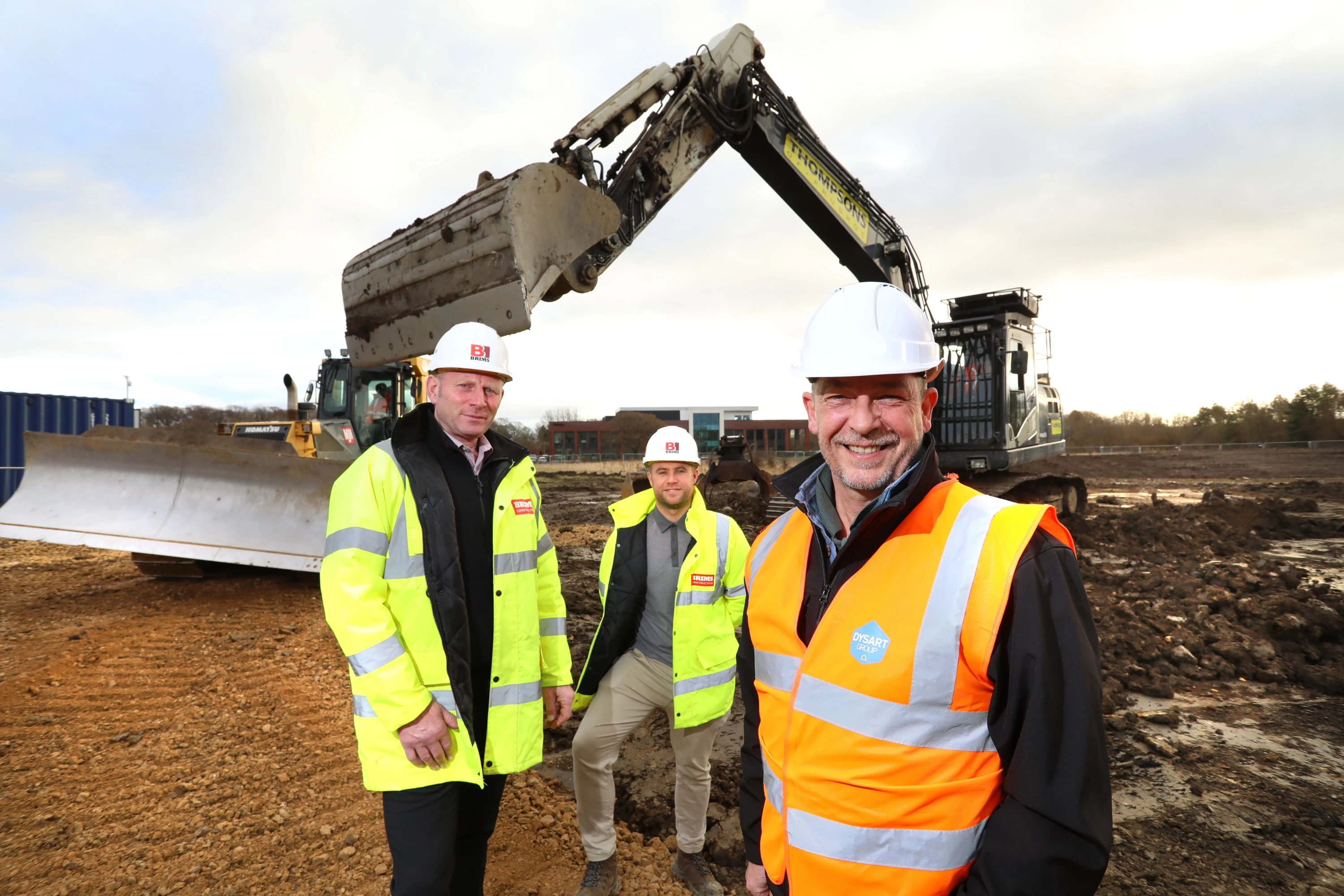 Mike Clark (front) of Tynexe Commercial, developers of AirView Park, with Peter Reek, Project Manager (right), and David Tait, Site Manager (centre), both of Brims Construction.