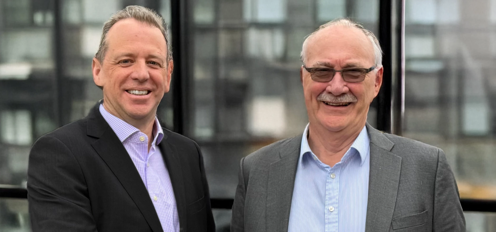 SettleParadigm - (L to R) Matthew Bailes, Paradigm Chief Executive and Rod Cahill, Settle Chief Executive.jpg