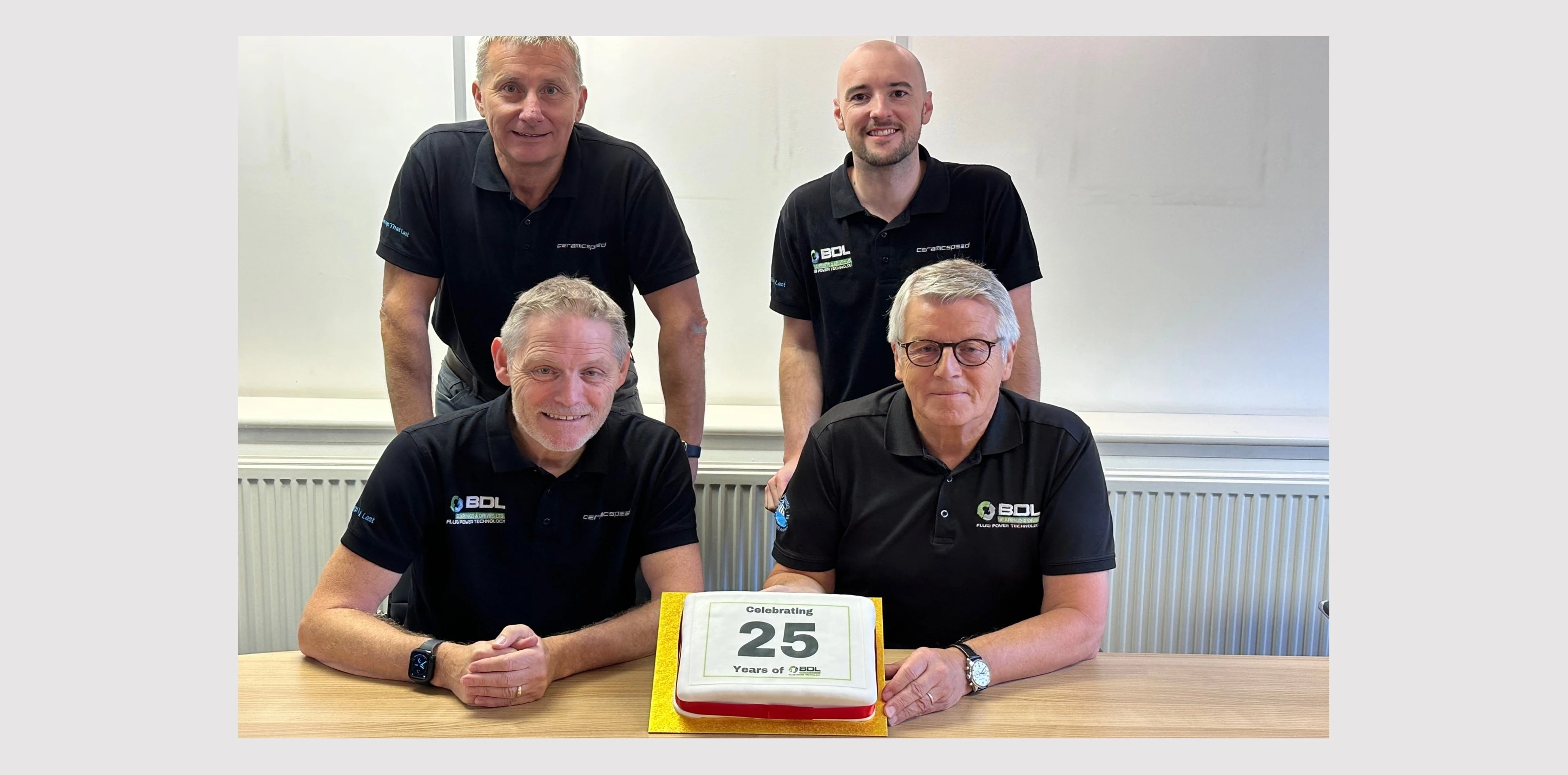 Bearings & Drives Celebrate 25 Years. Top left to right Steve Bacon, Ben Booth. Bottom left to right John Middleton, William Simpson 