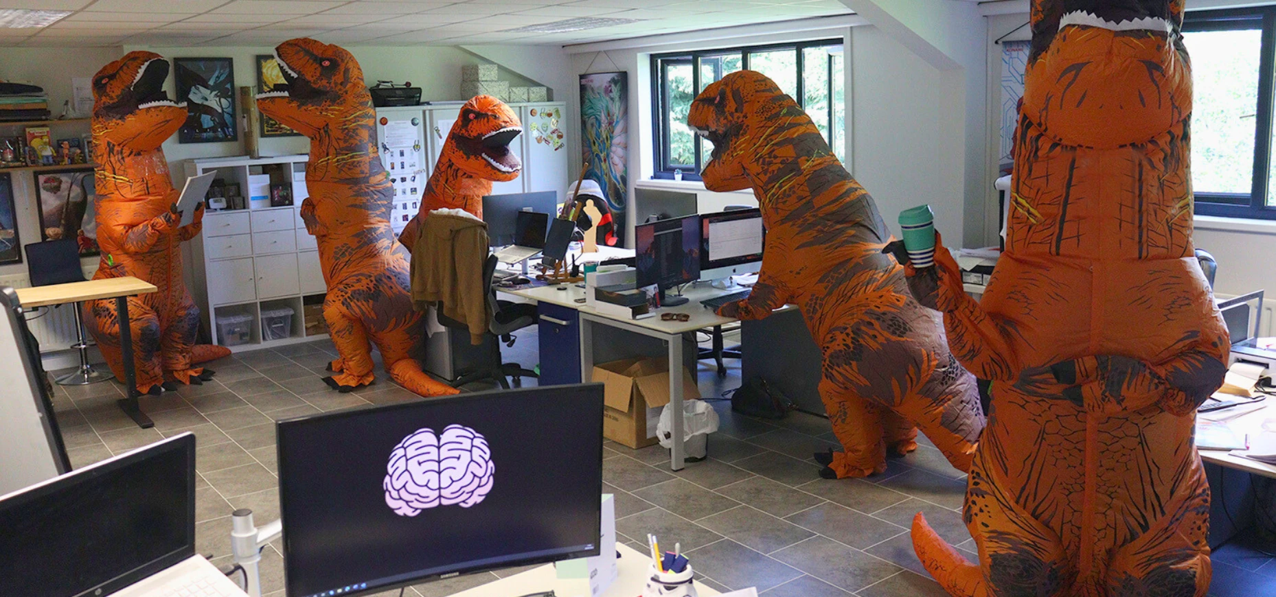 Fanattik team dresses up as dinosaurs to celebrate Universal Studios partnership