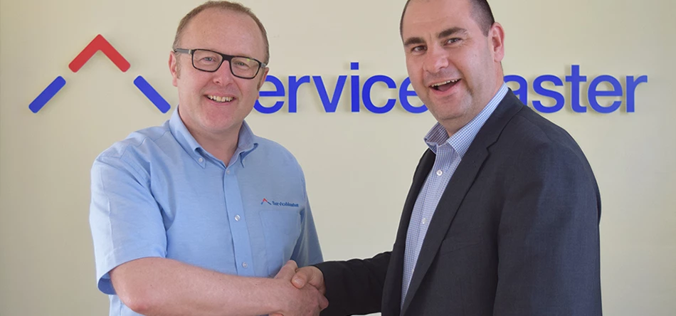 Alan Lewin, managing director, ServiceMaster UK with Martin Candy, franchise owner, Merry Maids of Bracknell and Farnborough