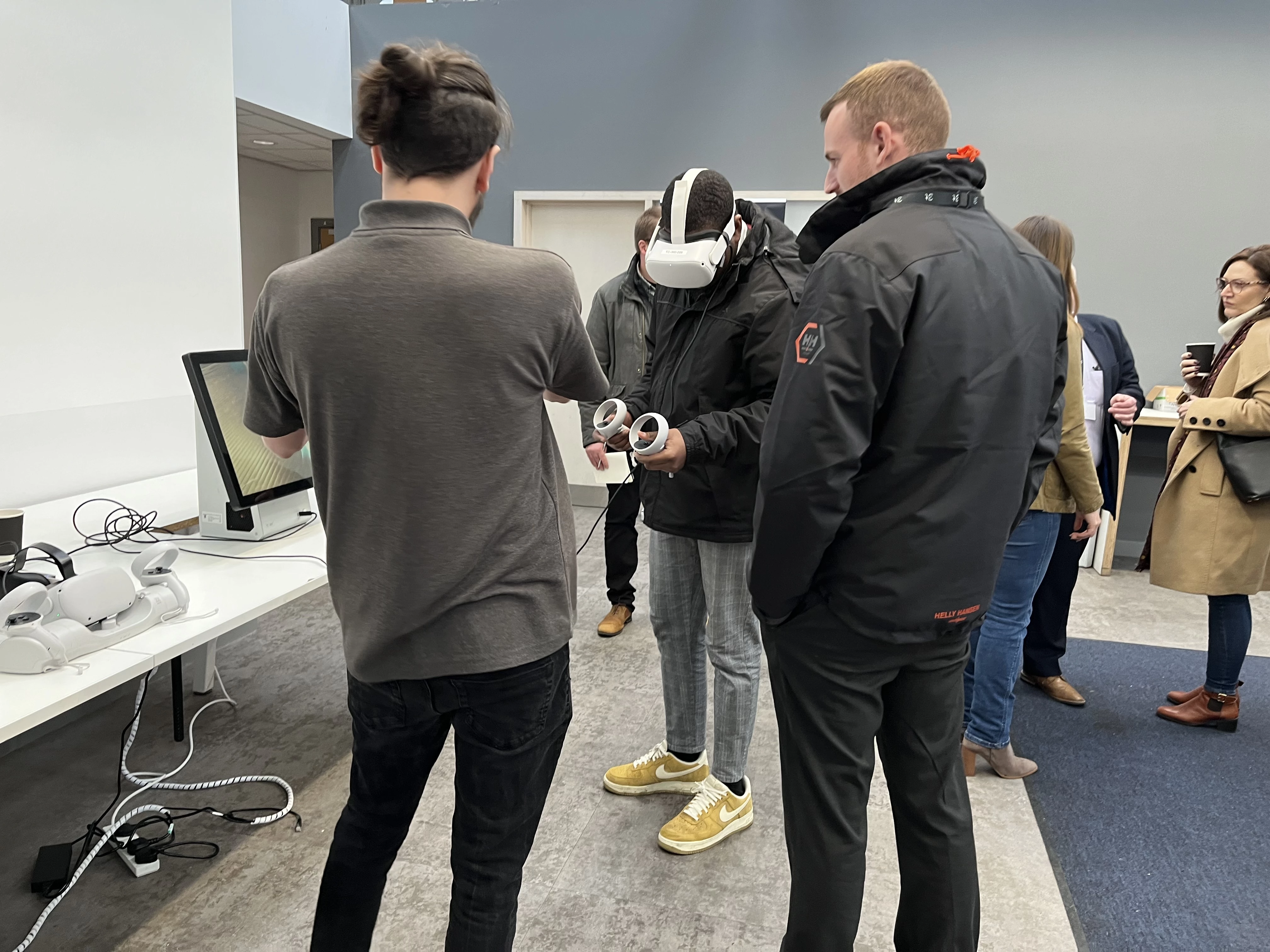 IGEM members try 3t's VR technology