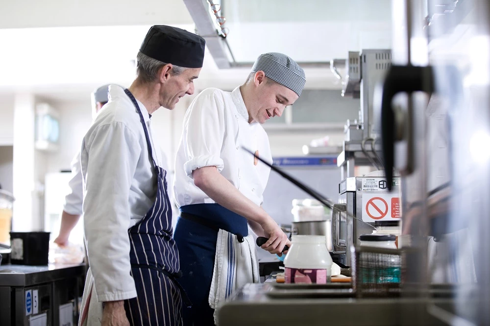 Neil Blackler, executive head chef at Holiday Inn, and Gateshead College student Lee Swainson