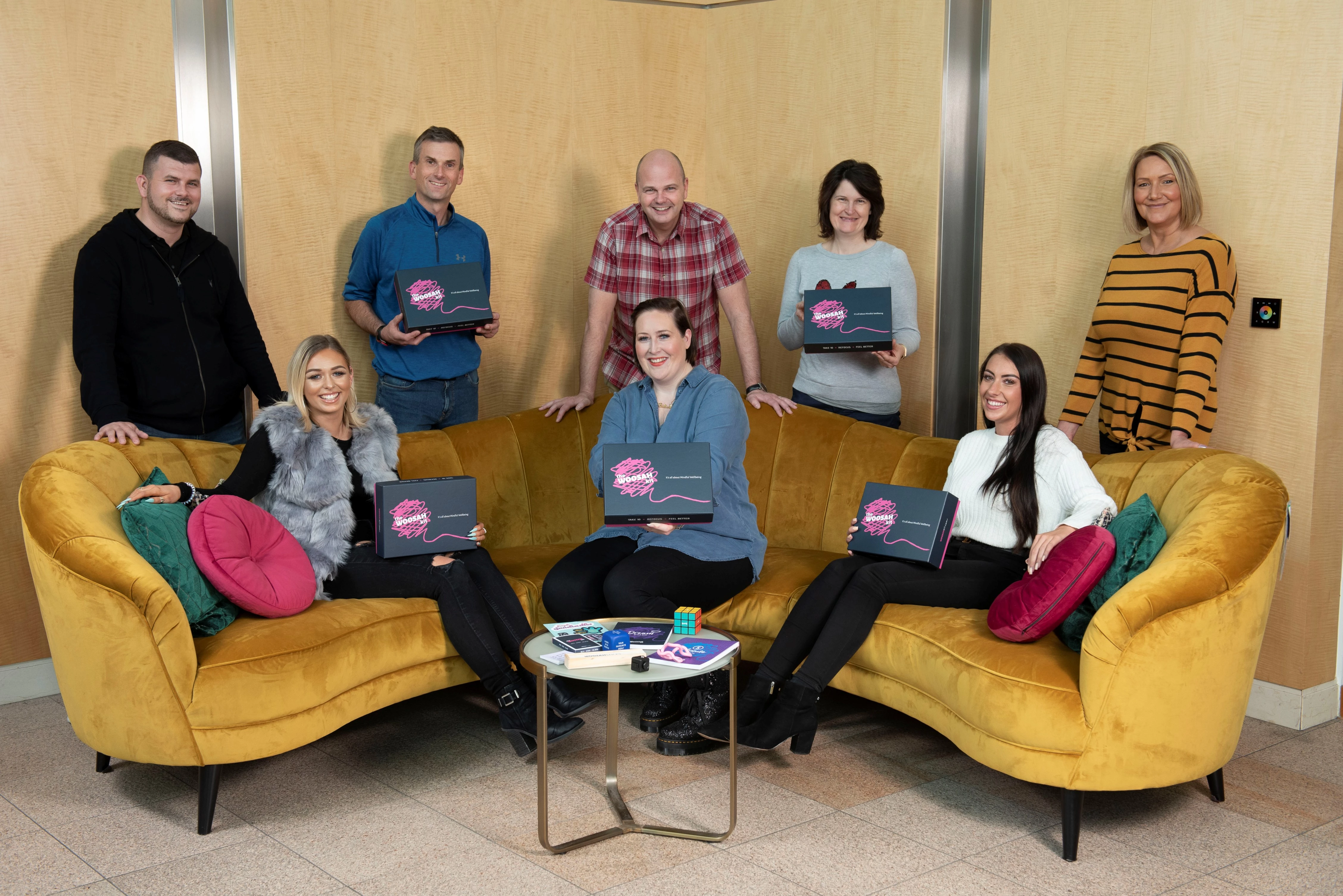 DFS Mental Health First Aiders with Sarah Kelly Creator of the Woosah Kit. L-R - Alex Lyle, Chloe Hargreaves, Steve Tupholme, Paul Johnson, Sarah Kelly, Sam Robins, Sarah Hey, Susan Bower. 