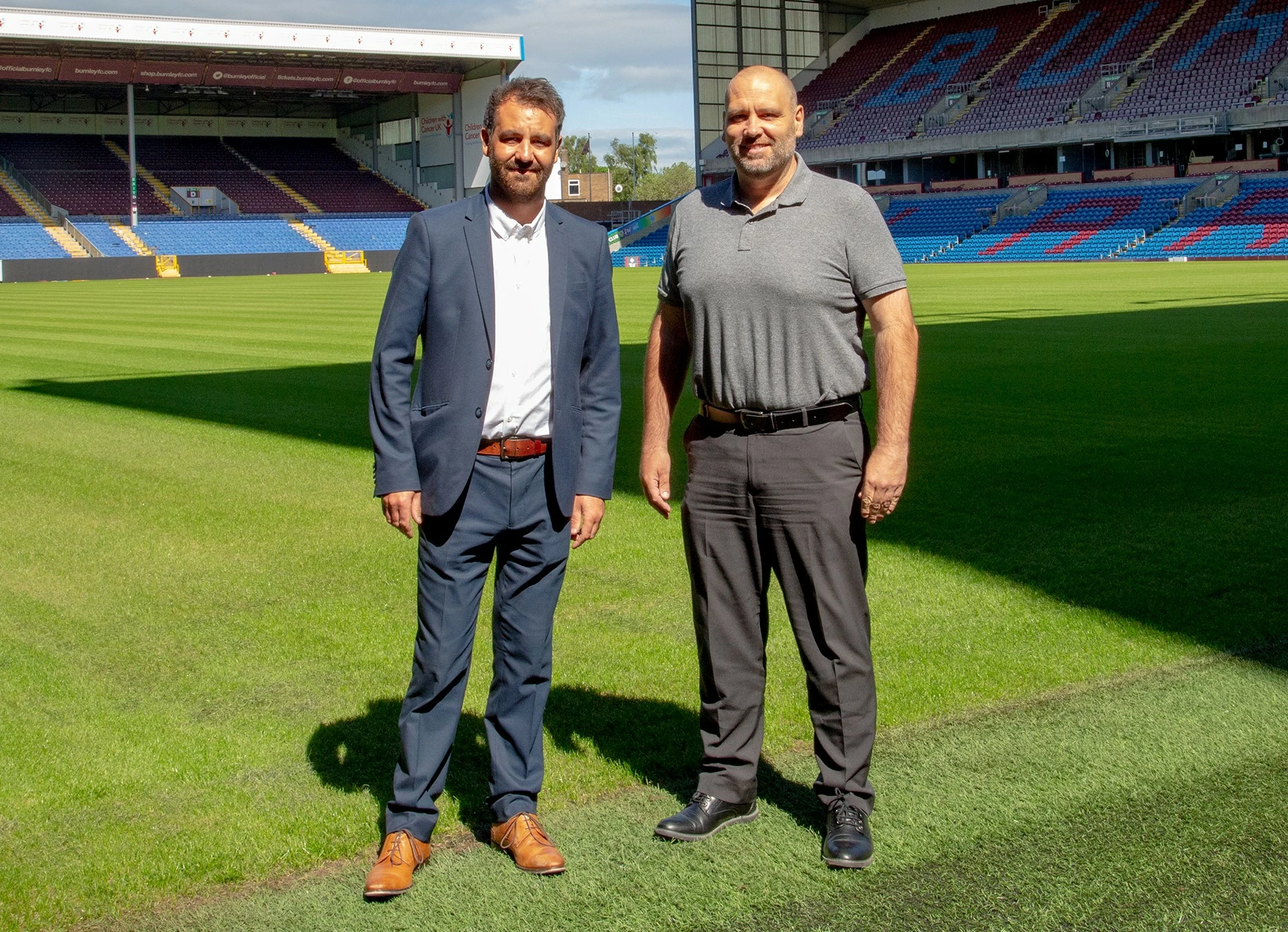 L-r: Ben Bottomley, Burnley FC in the Community, Steve Harrison, Communications Plus at Burnley FC’s Turf Moor ground