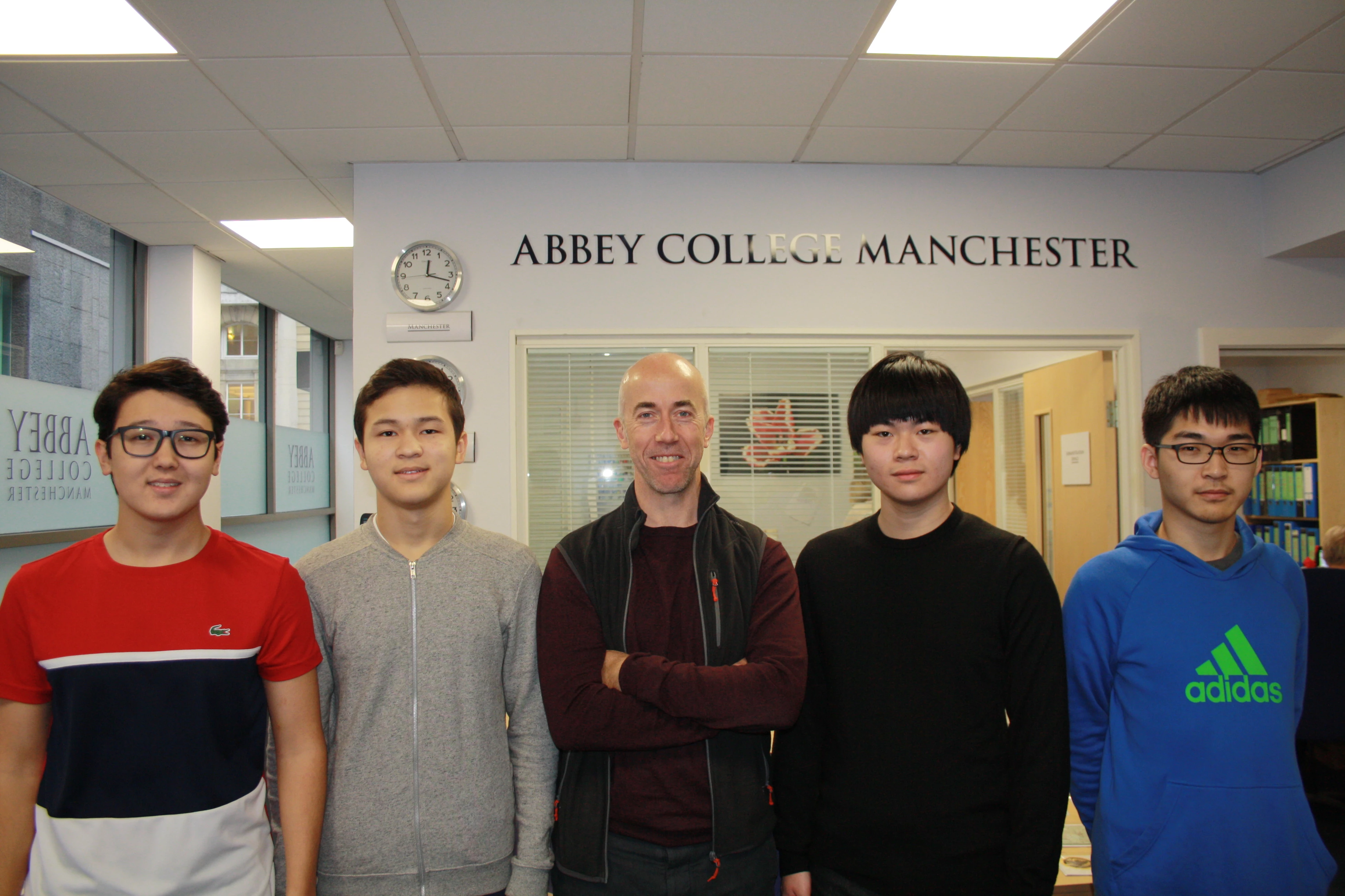 Abbey College Manchester Maths Olympiad Team with Maths Teacher Andrew Duggan (Centre)