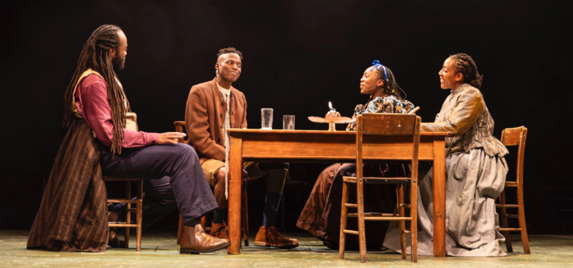 Mr and Mrs Cratchit, Tim and Belinda, played by Gabriel Akamo, Alicia McKenzie, Taku Mutero and Gigi Noel-King.jpeg