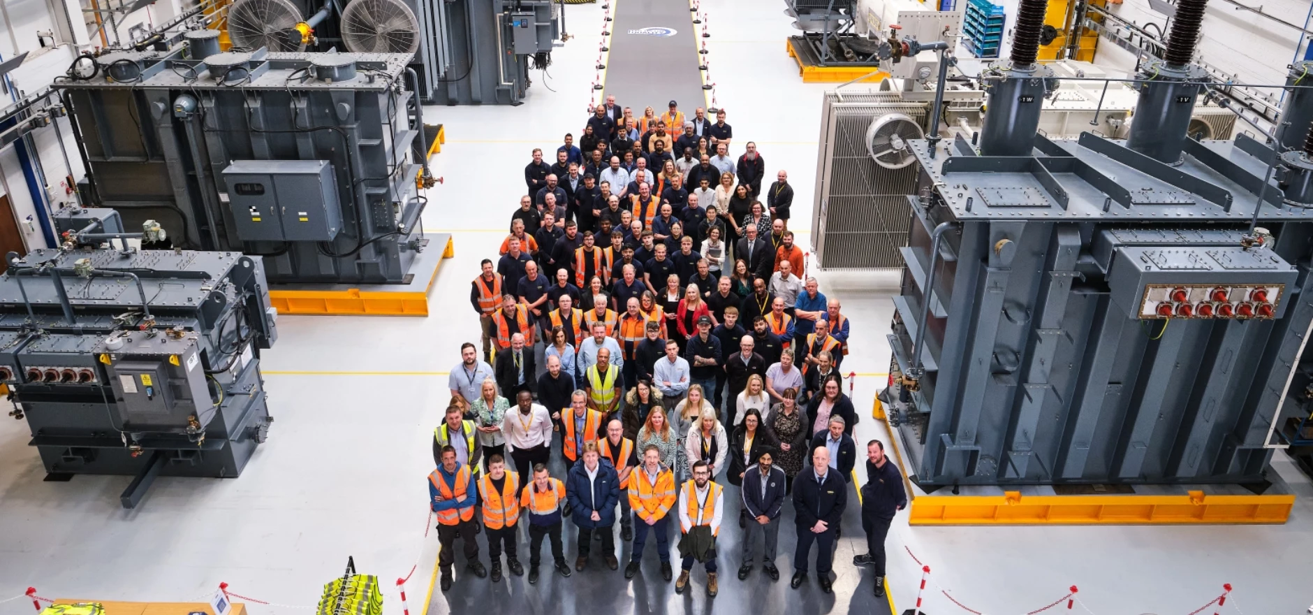 BRUSH Group employees gather at the firm's state-of-the-art transformer 'test cell' facility in Loughborough, UK (mid res).jpg
