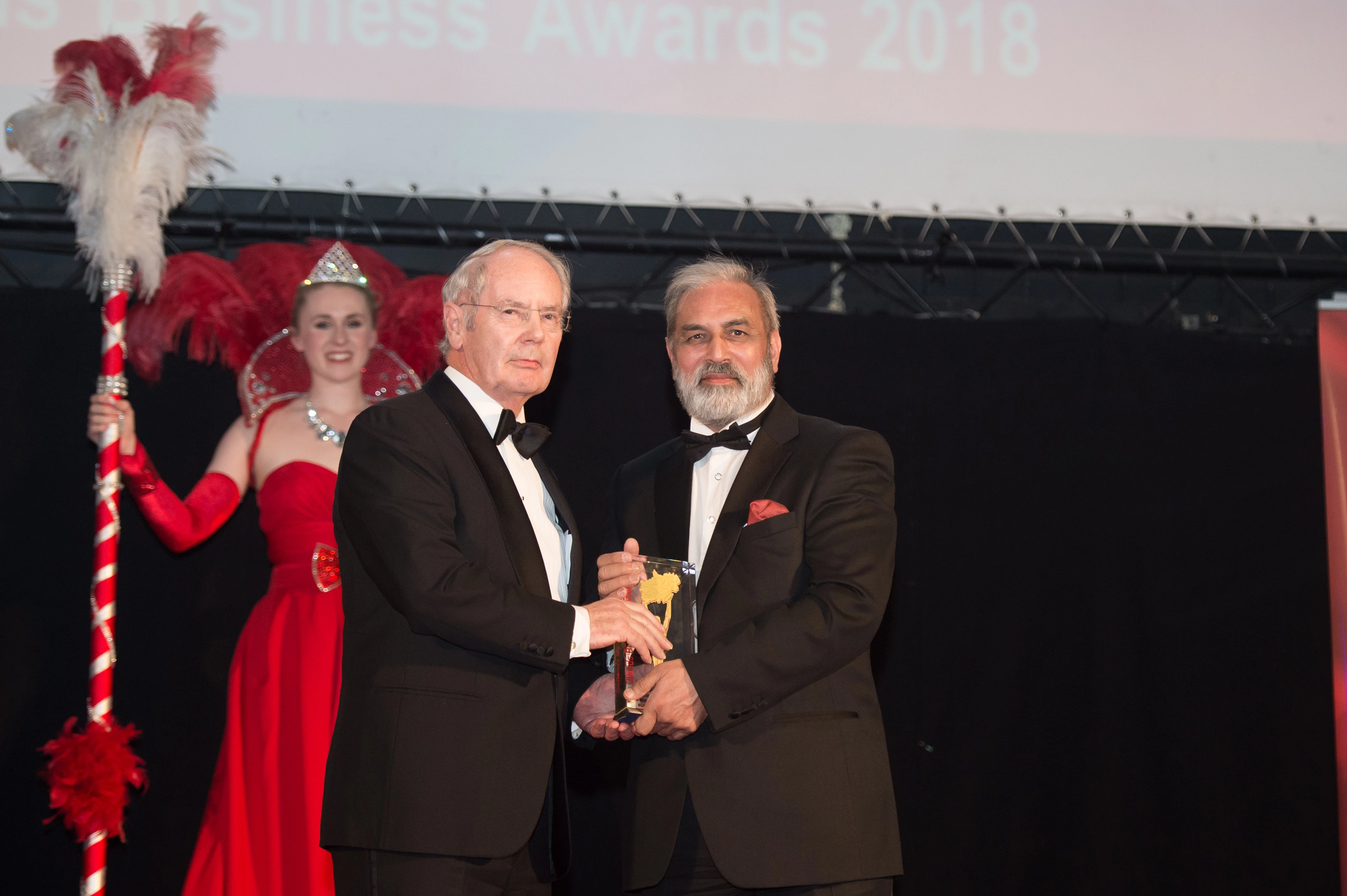 Sir Peter Rigby is presented with the Lifetime Contribution to Midlands Business Award by Harj Sandher from the Midlands Business Awards
