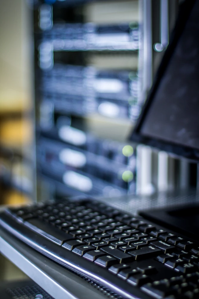 computer with data centre in background