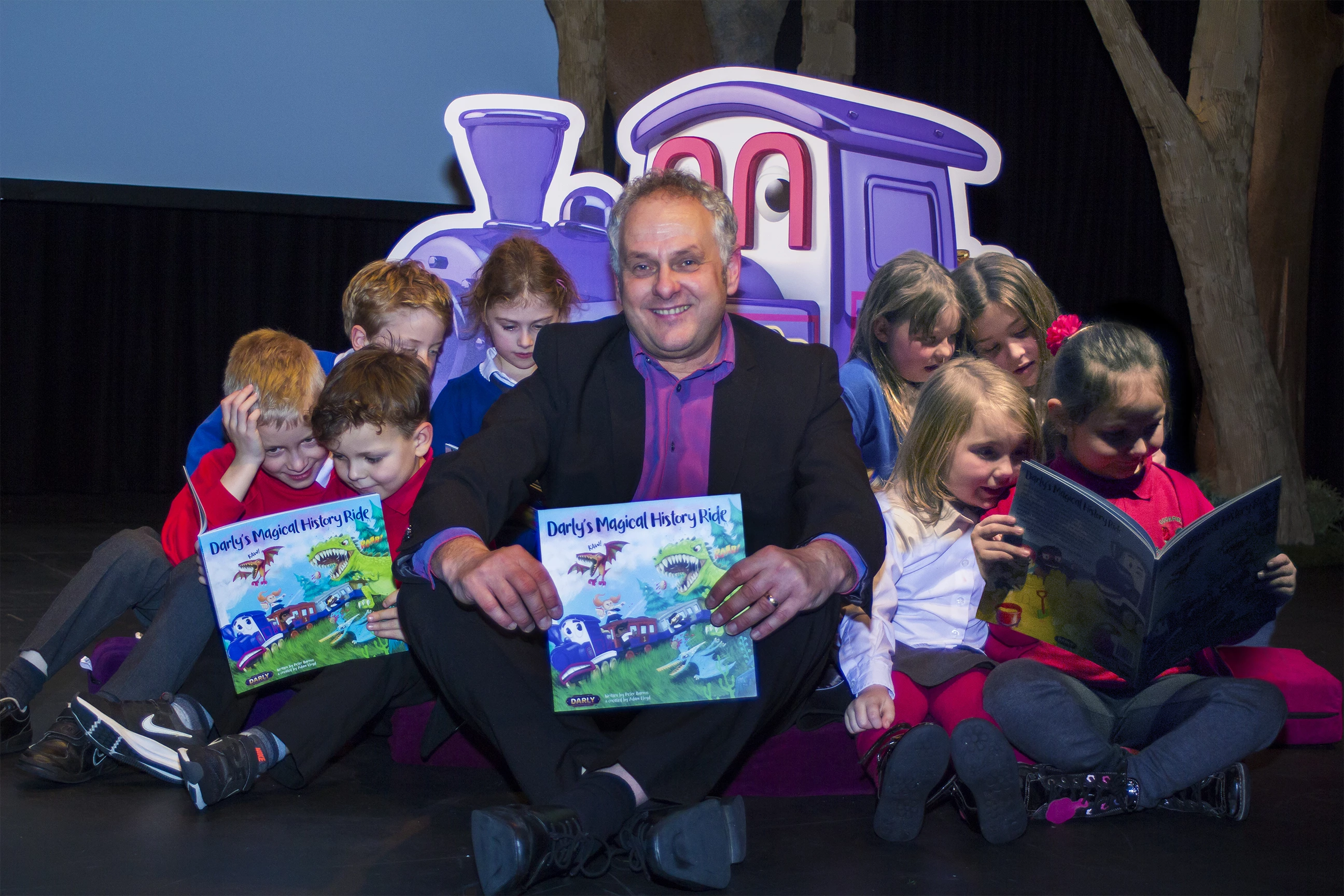 Author Peter Barron with children from Cockfield and Green Lane primary schools at the launch of Darly's Magical History Ride