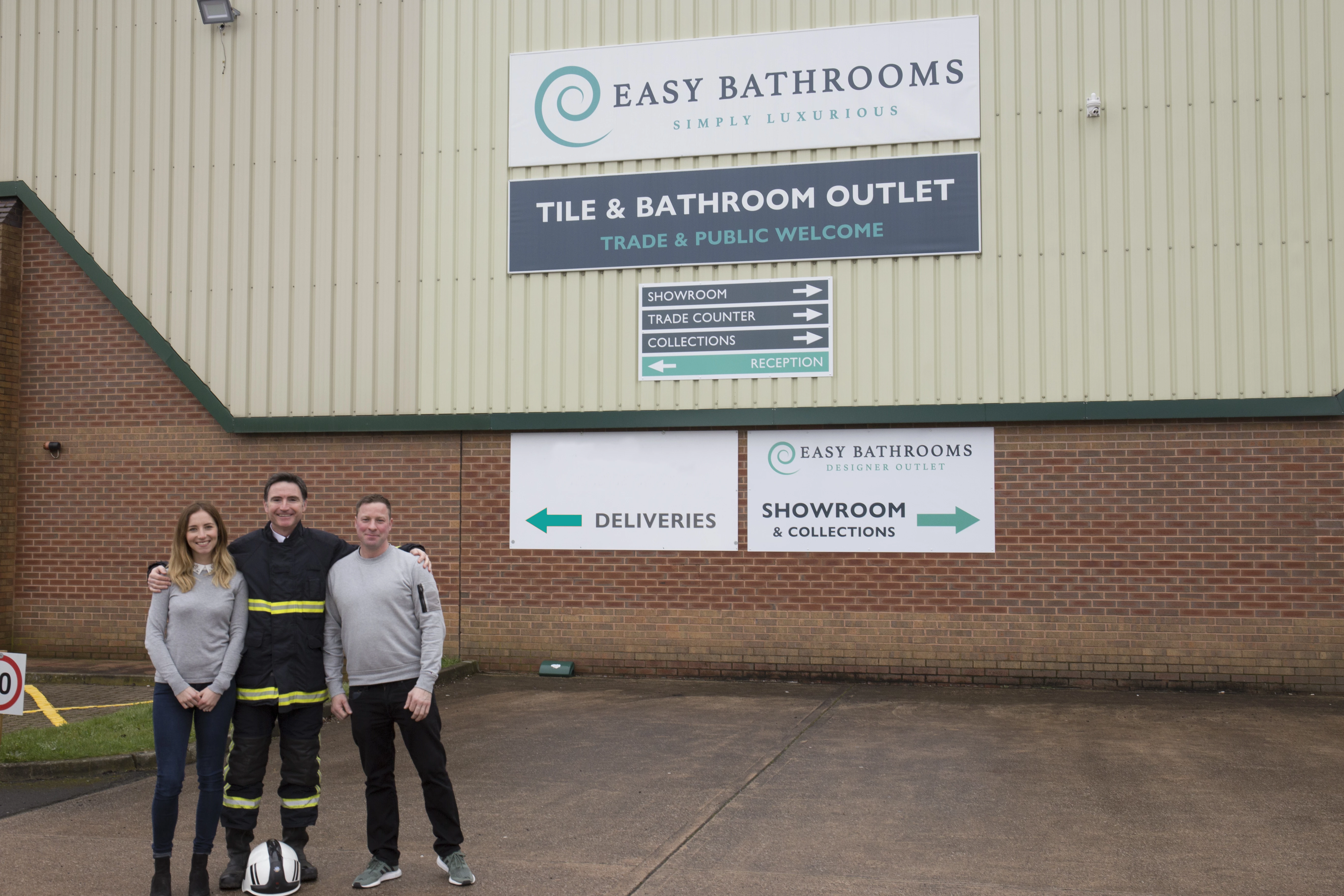 Easy Bathrooms' operations manager Lauren Fealy, with her father Stephen Fealy of West Yorkshire Fire and Rescue Service and Craig Waddington, Easy Bathrooms' founder/MD
